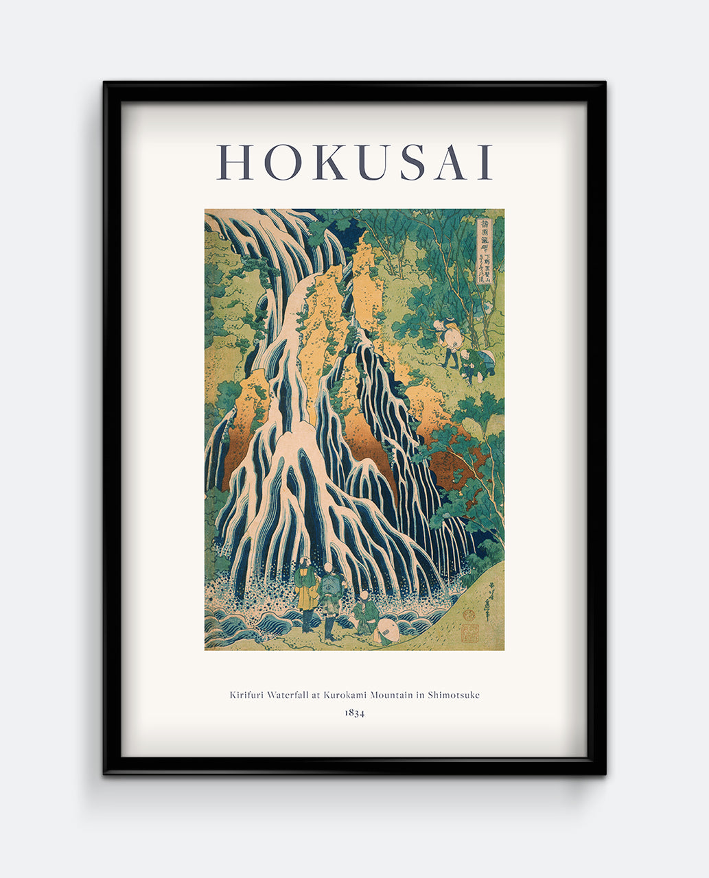 A framed print titled 'HOKUSAI' featuring an traditional Japanese woodblock style image of a waterfall.